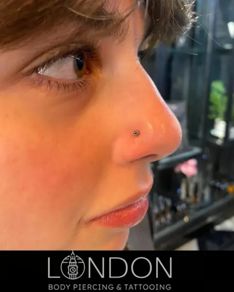 Nostril piercing, by Chandre Louw