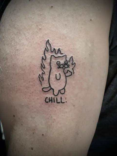 Flaming cat with Chill lettering tattoo, by Kayla Grimwood