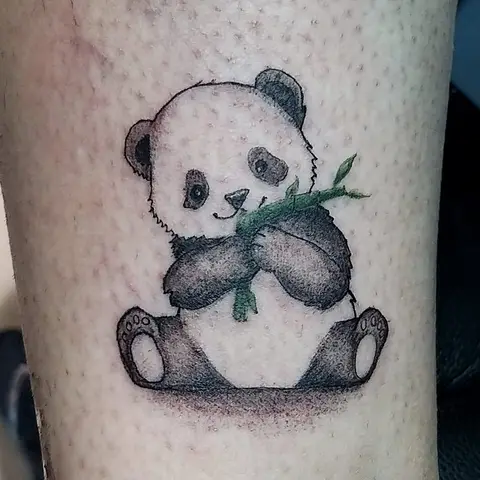 Panda eating bamboo tattoo, by Kayla Grimwood