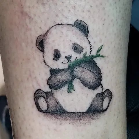 Panda eating bamboo tattoo, by Kayla Grimwood