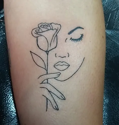 Rose and face line art tattoo, by Kayla Grimwood