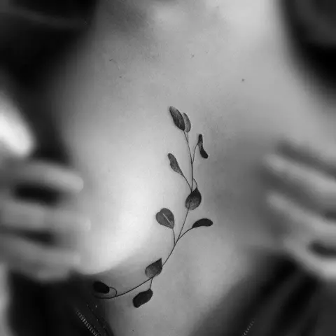Fine line leafy vine tattoo, by Rob Turner