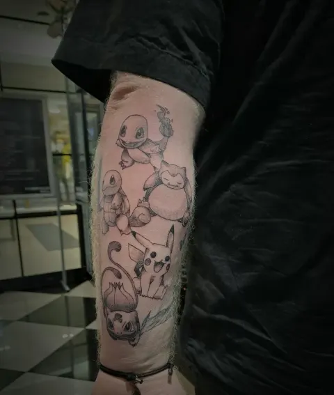 Pokémon forearm sleeve tattoo on the forearm, by Tayla Symons